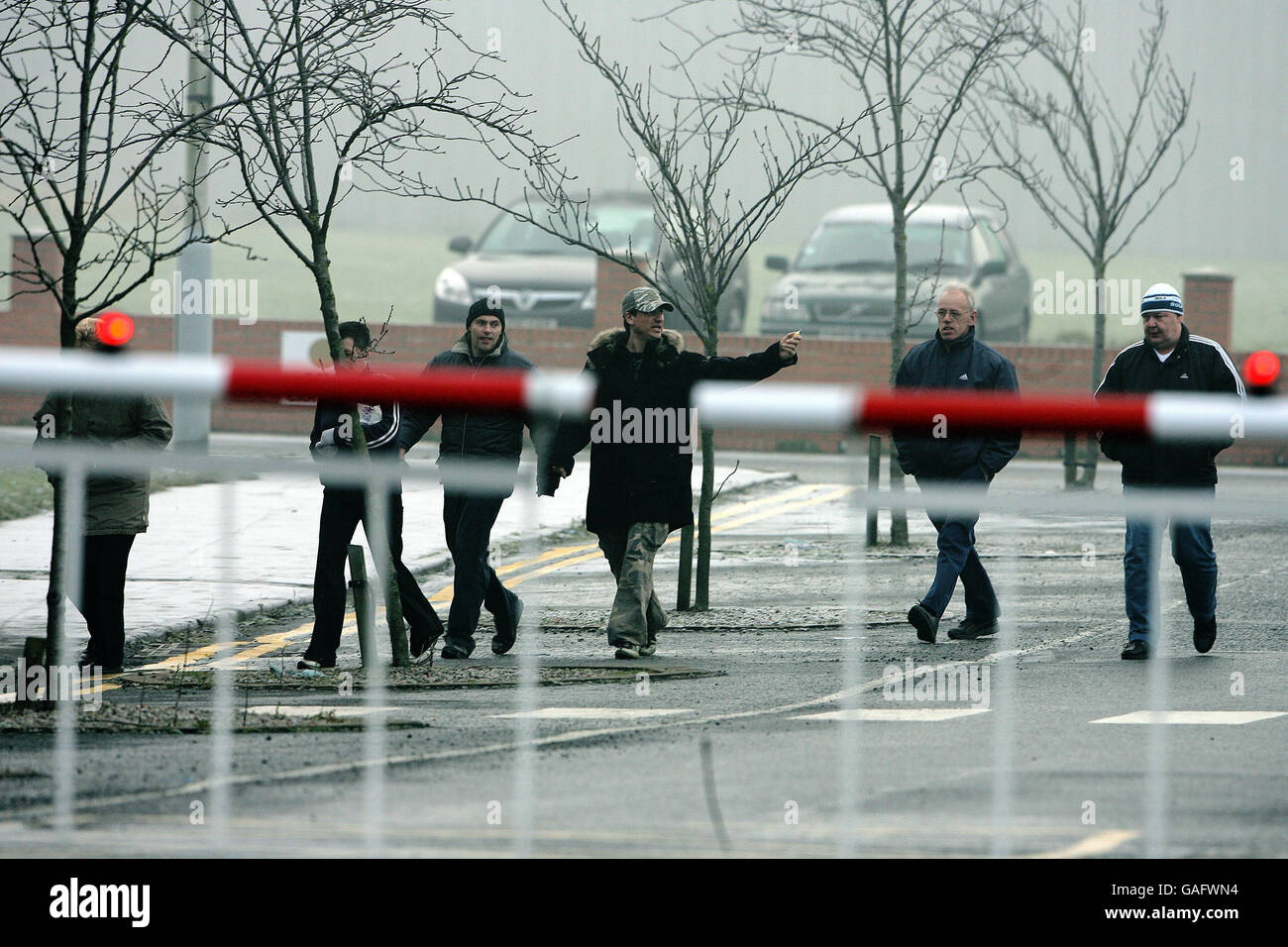 Workers leave the Electrolux factory in Spennymoor, County Durham, on the day the Swedish appliances group annouced it was to close. Stock Photo