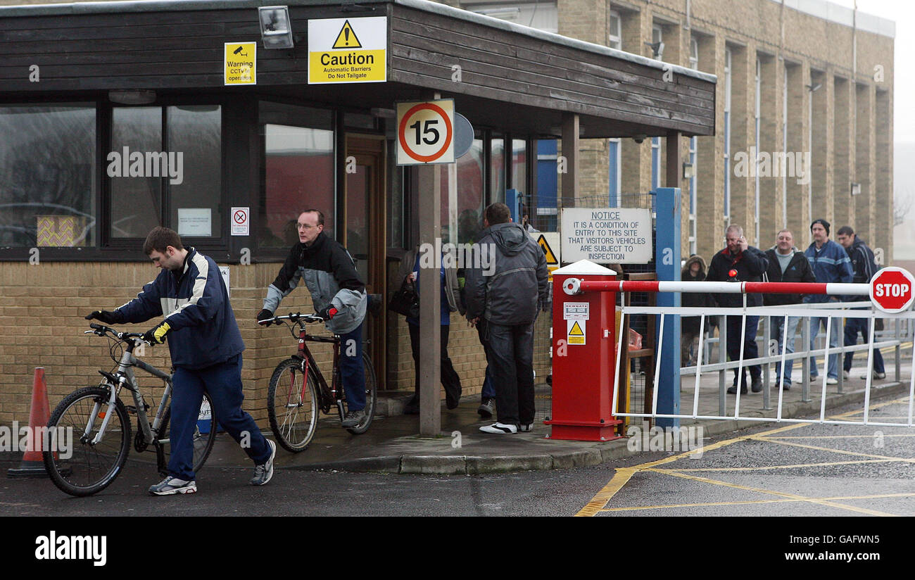 Workers leave the Electrolux factory in Spennymoor, County Durham, on the day the Swedish appliances group announced it was to close. Stock Photo