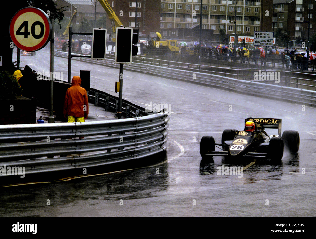 Two Race Cars Moving At High Speed In Slightly Wet Conditions Stock Photo -  Download Image Now - iStock