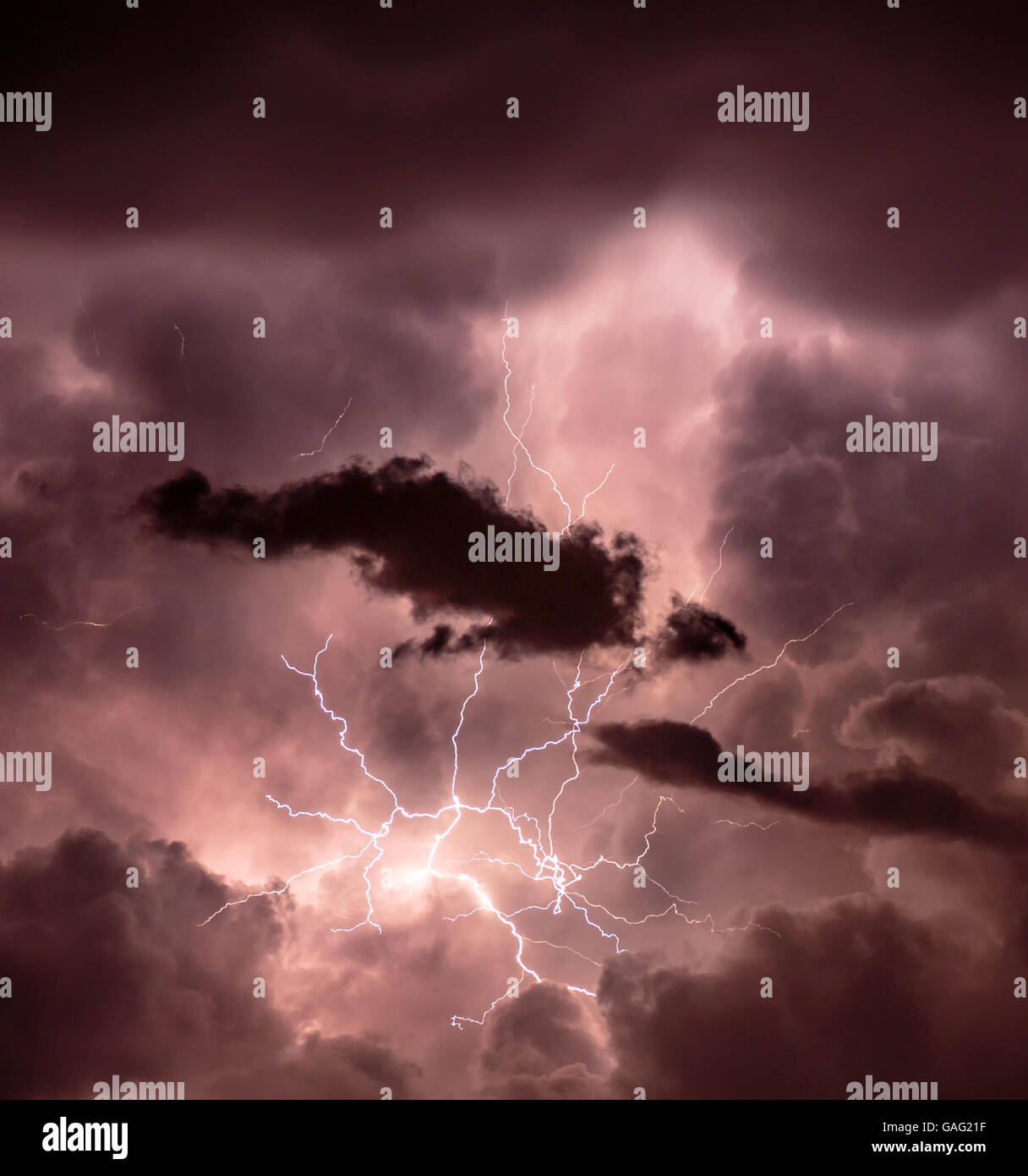 Cloudscape with lightning bolt hitting among the clouds Stock Photo - Alamy