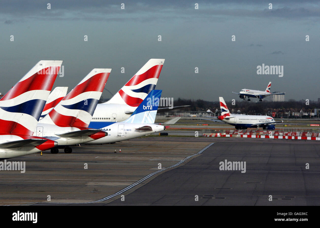 General picture of planes waiting at gates airside at Heathrow Airport ...