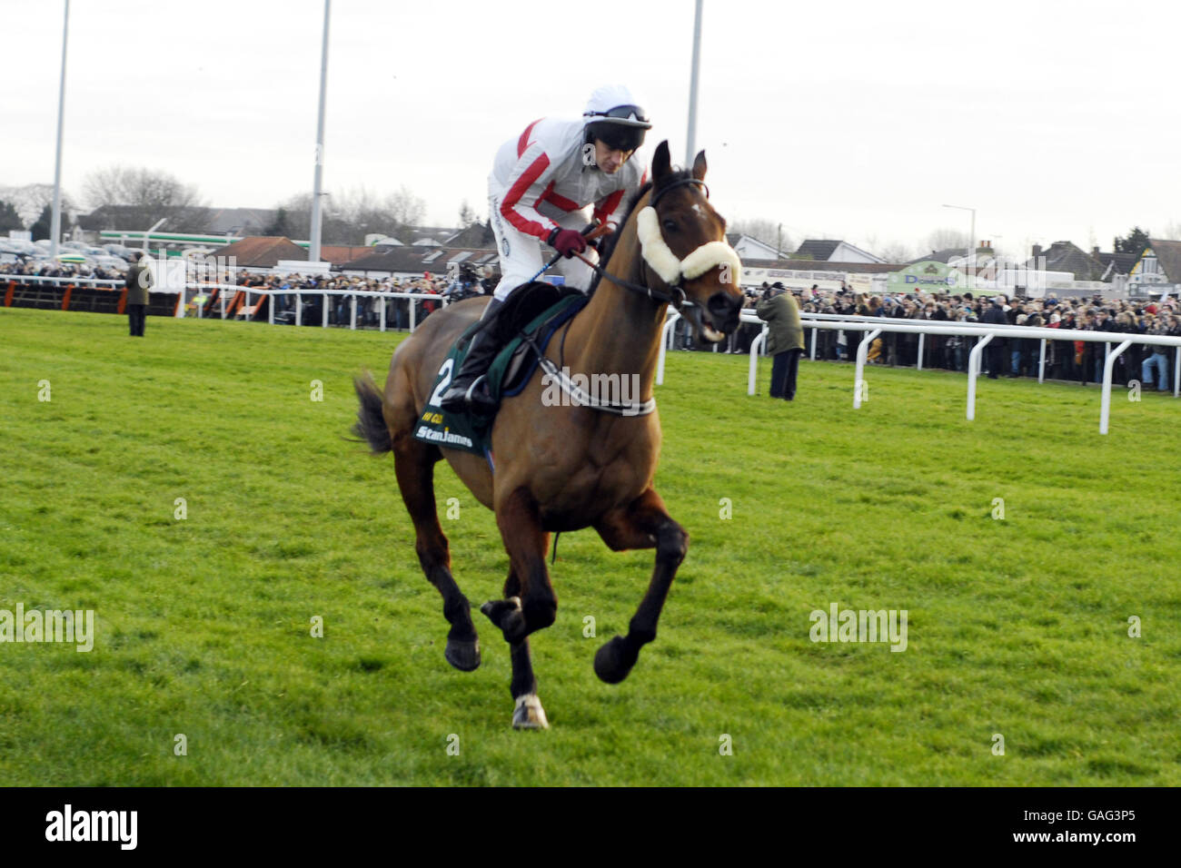 Hi Cloy ridden by Philip Carberry in the Stan James King George V1 Chase (Grade 1) Stock Photo