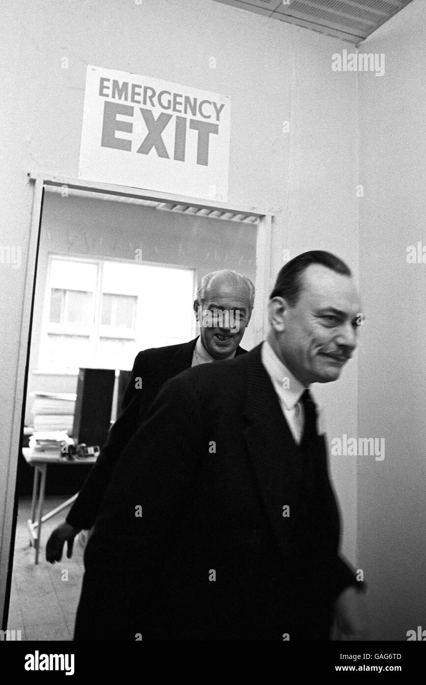 Enoch Powell arrives to address the conference on the explosive subject of immigration through the emergency exit. Stock Photo