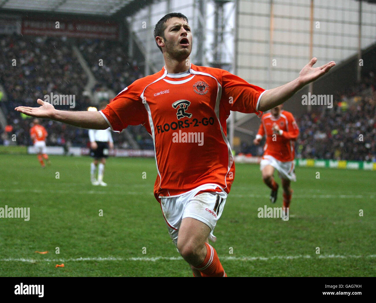 Blackpool's Wes Hoolahan celebrates scoring his penalty against Preston North End during the Coca-Cola League Championship match at Deepdale, Preston. Stock Photo