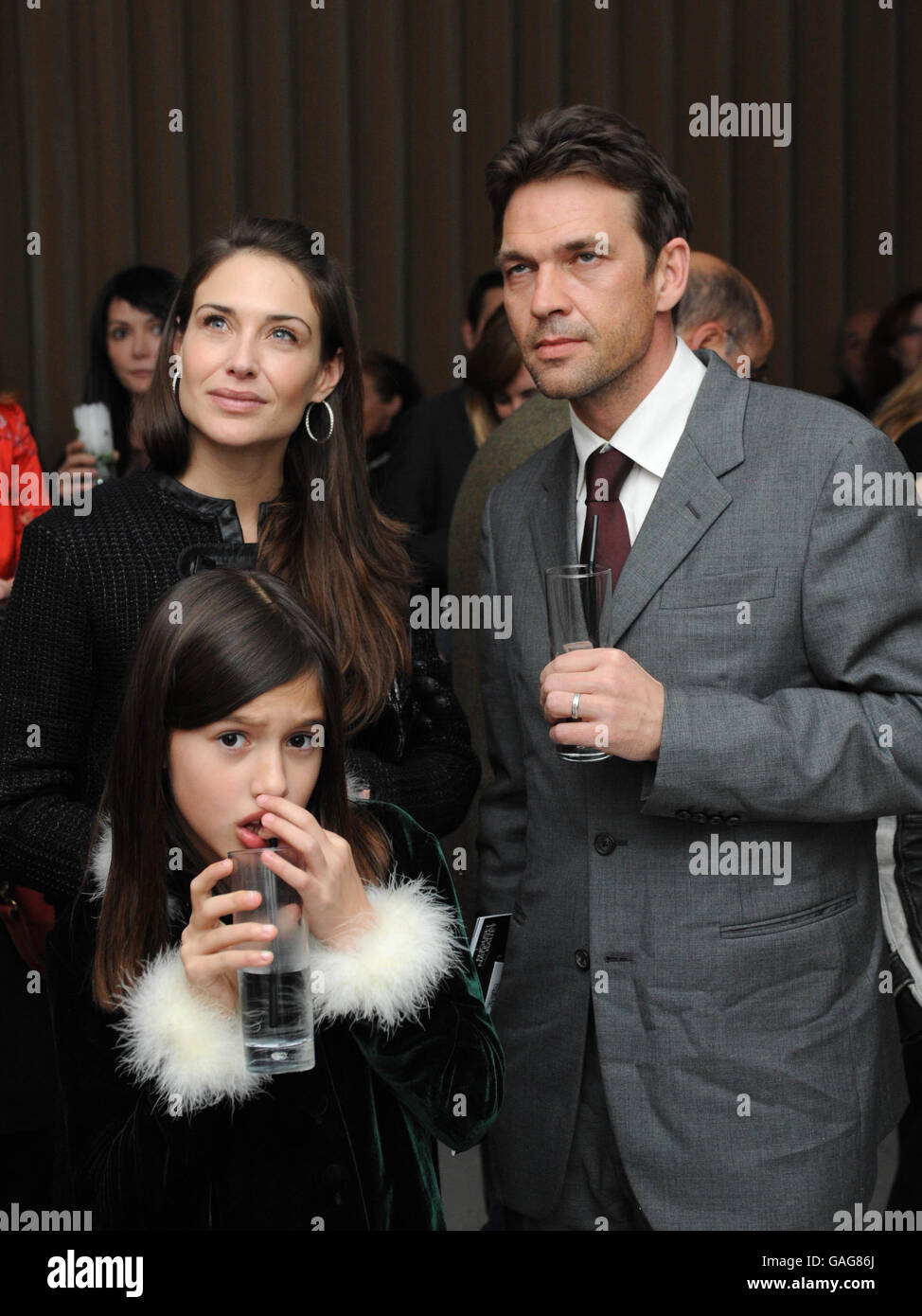 Actor Dougray Scott and wife, actress Claire Forlani arrive for a VIP performance of Night of The Snow Queen to launch the English National Ballet's Christmas Season, at the Coliseum in London. Stock Photo