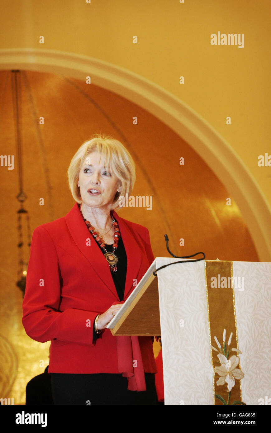 Diana Moran does a reading at St Peters Church in Belgravia, London, for the Blue Cross pet charity's Carol Concert. Stock Photo