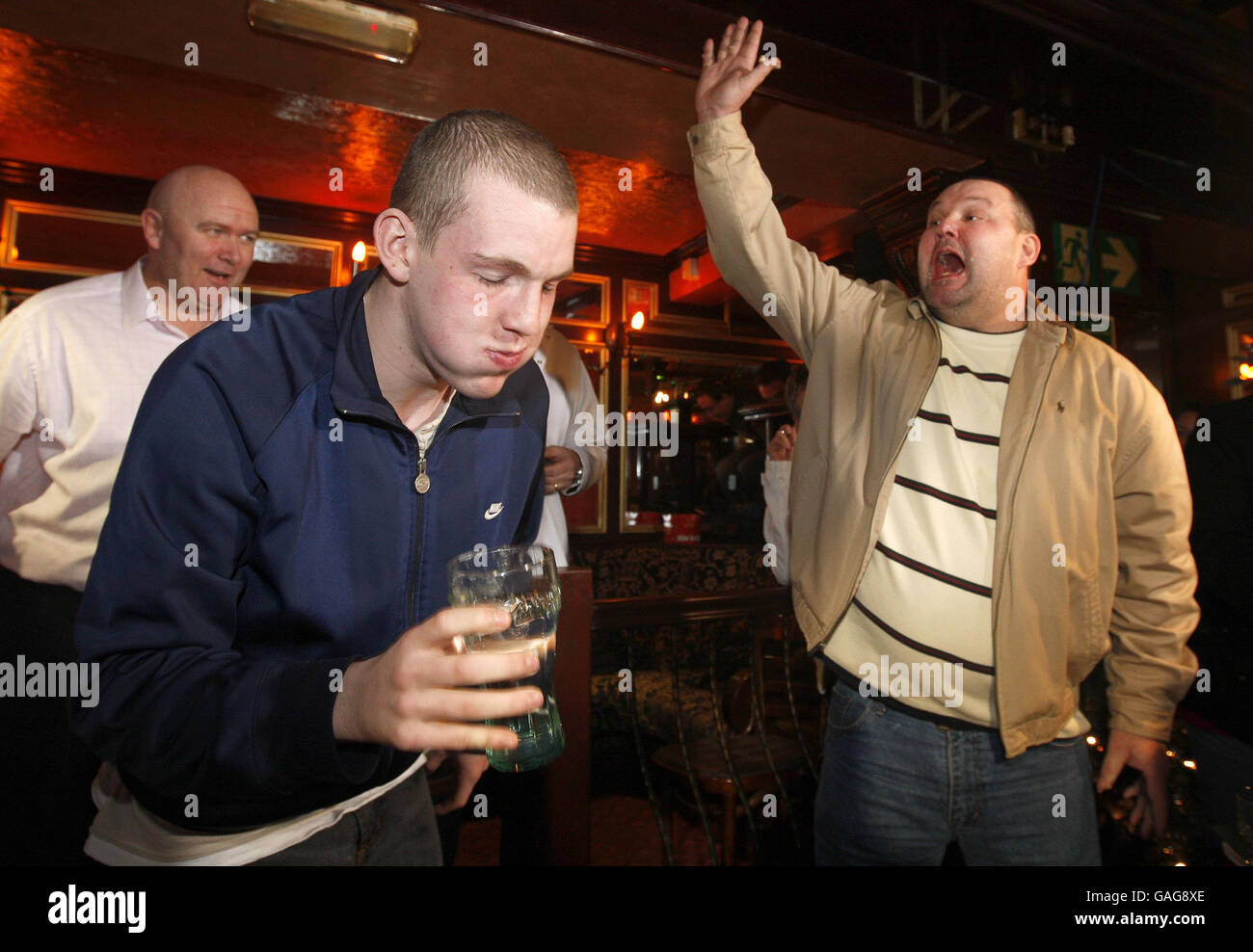 Last year's winner Brendan Brockbank (centre) loses out in a Pie Off to Adrian Frost (right