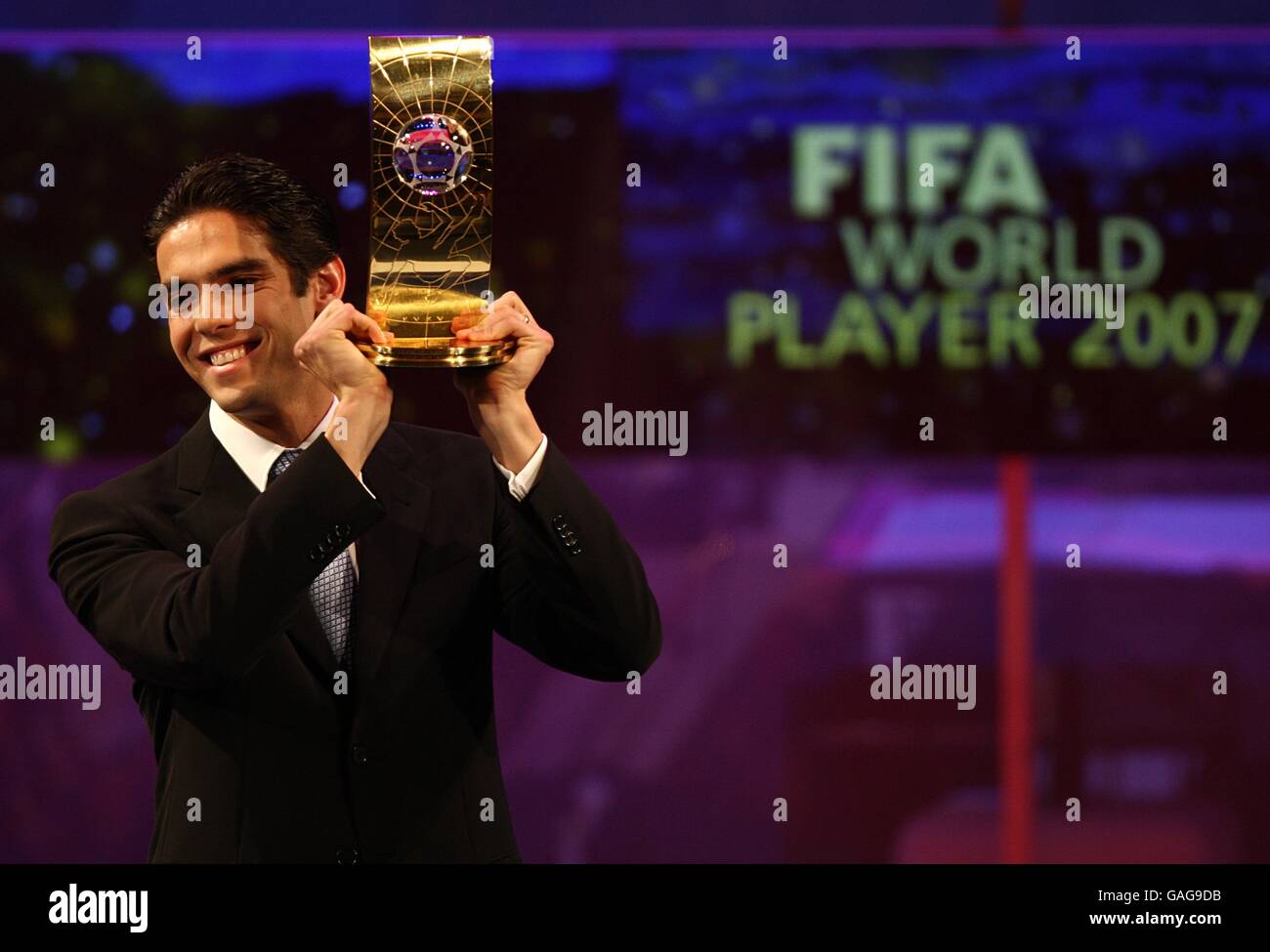 AC Milan's Kaka lifts his FIFA World Player of the Year award at the