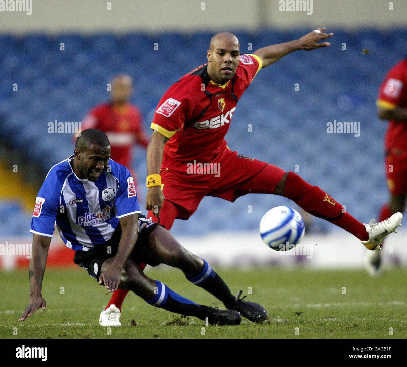 Sheffield Wednesday's Michael Johnson (right) and Watford's Marlon King in action during the Coca-Cola Football League Championship match at Hillsborough, Sheffield. Stock Photo