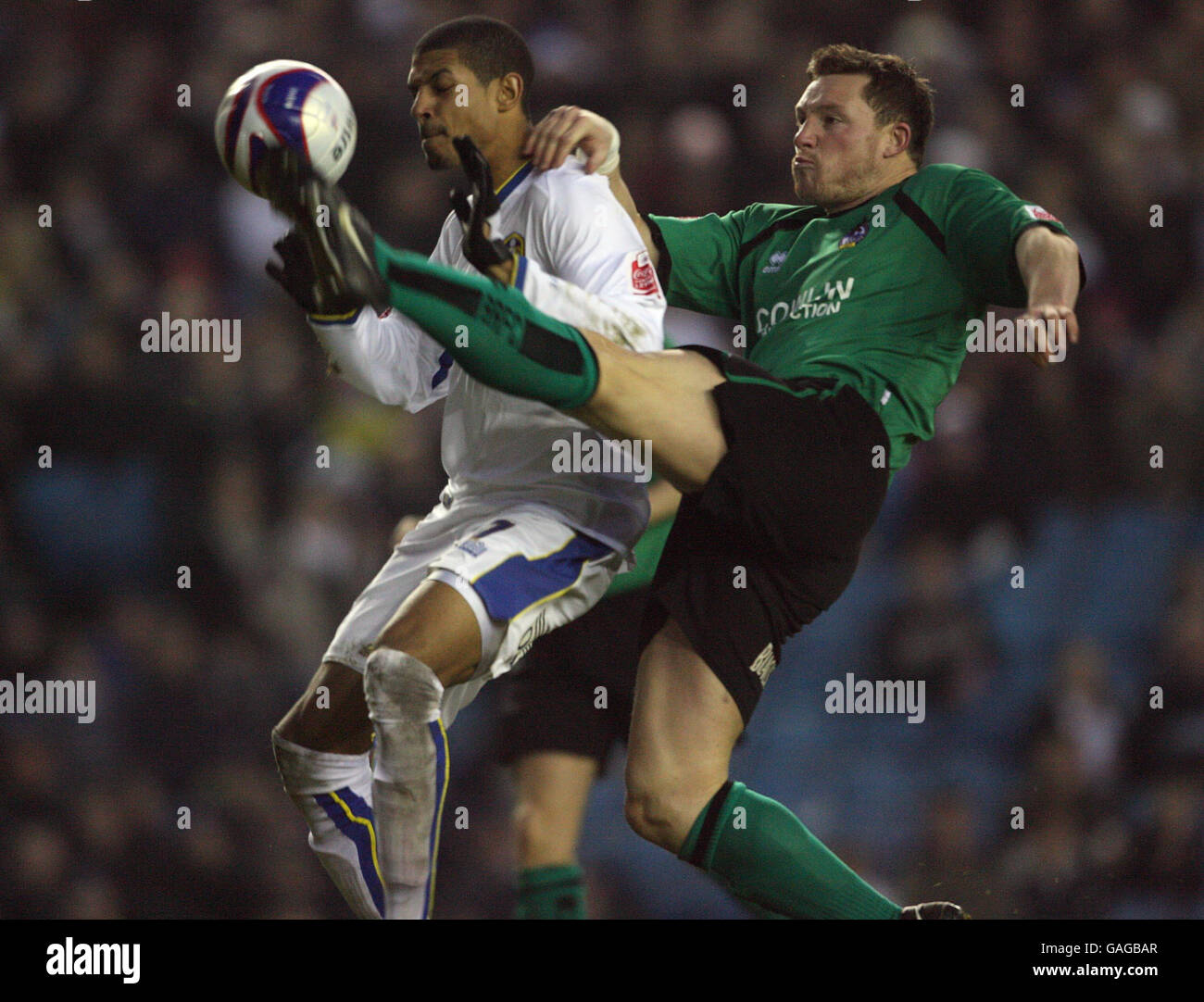 Leeds United's Jermaine Beckford and Bristol Rovers Steve Elliott in action during the Coca-Cola Football League One match at Elland Road, Leeds. Stock Photo