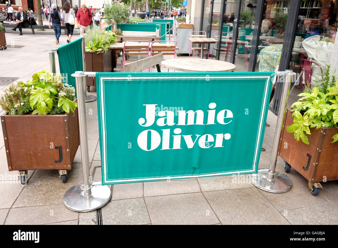 Empty tables outside Janie Oliver restaurant in Cardiff. July 2016 Stock Photo