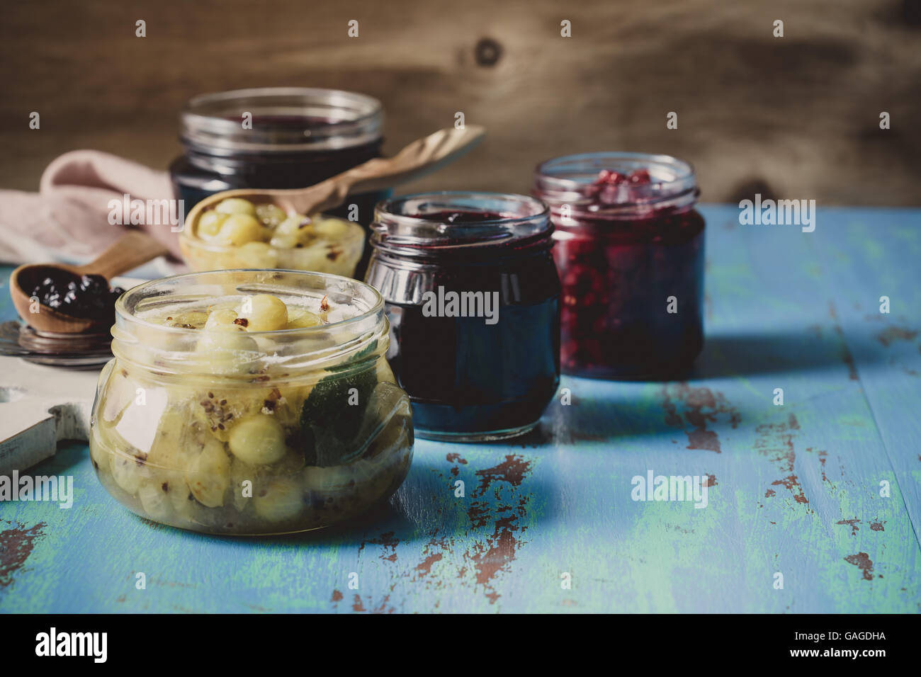 Different berry jelly. Homemade organic blueberry, raspberry and