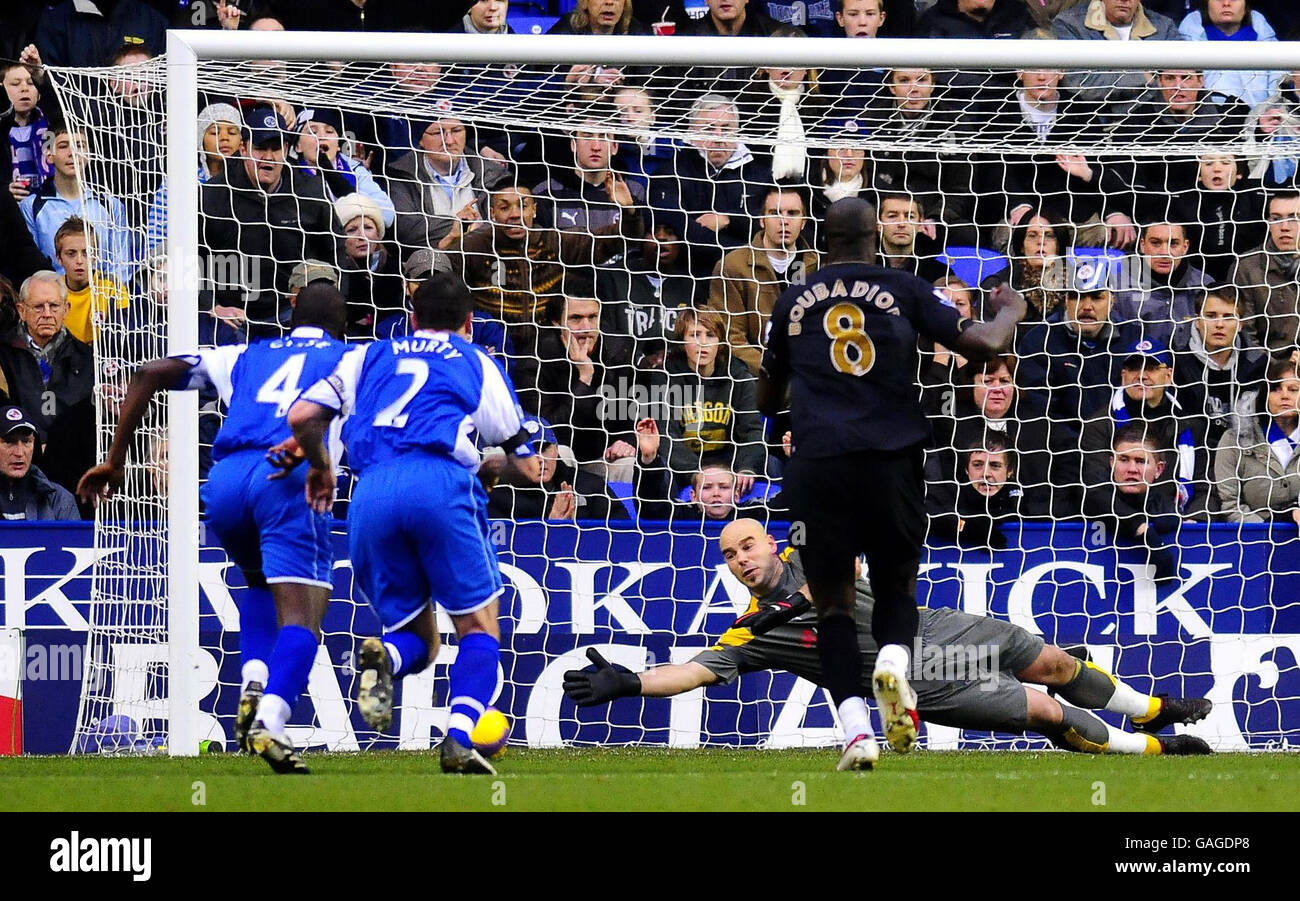 Reading's keeper Marcus Hahnemann saves Niko Kranjcar's penalty during the Barclays Premier League match at the Madejski Stadium, Reading. Stock Photo