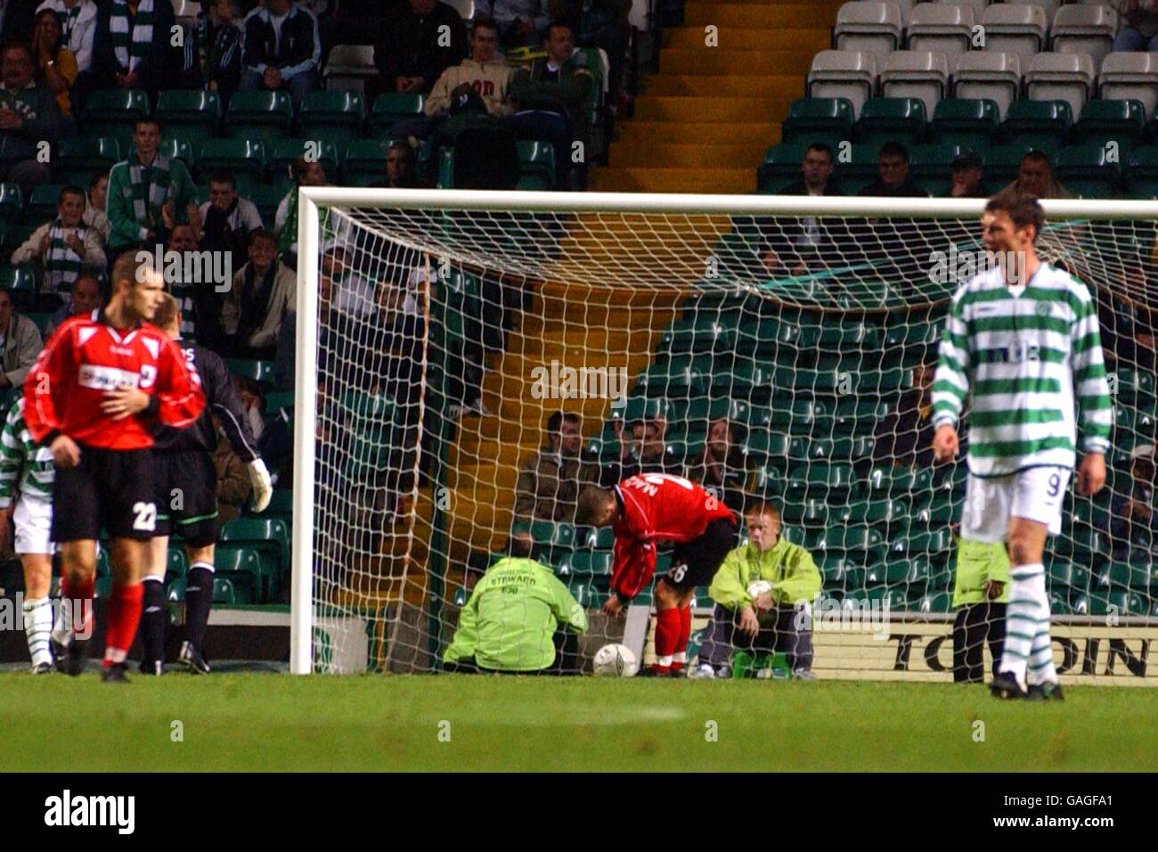 Soccer - UEFA Cup - First Round - First Leg - Celtic v FK Suduva. FK Suduva's Nerijus Haciulis gets the ball out of the net after his side scored in the 8-1 defeat at Celtic Stock Photo
