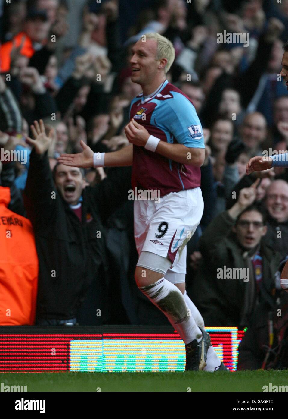 West Ham United's Dean Ashton celebrates scoring the equalising goal to ...