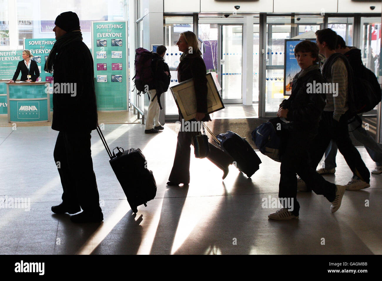 Airports 'coping well' with new baggage rules Stock Photo Alamy