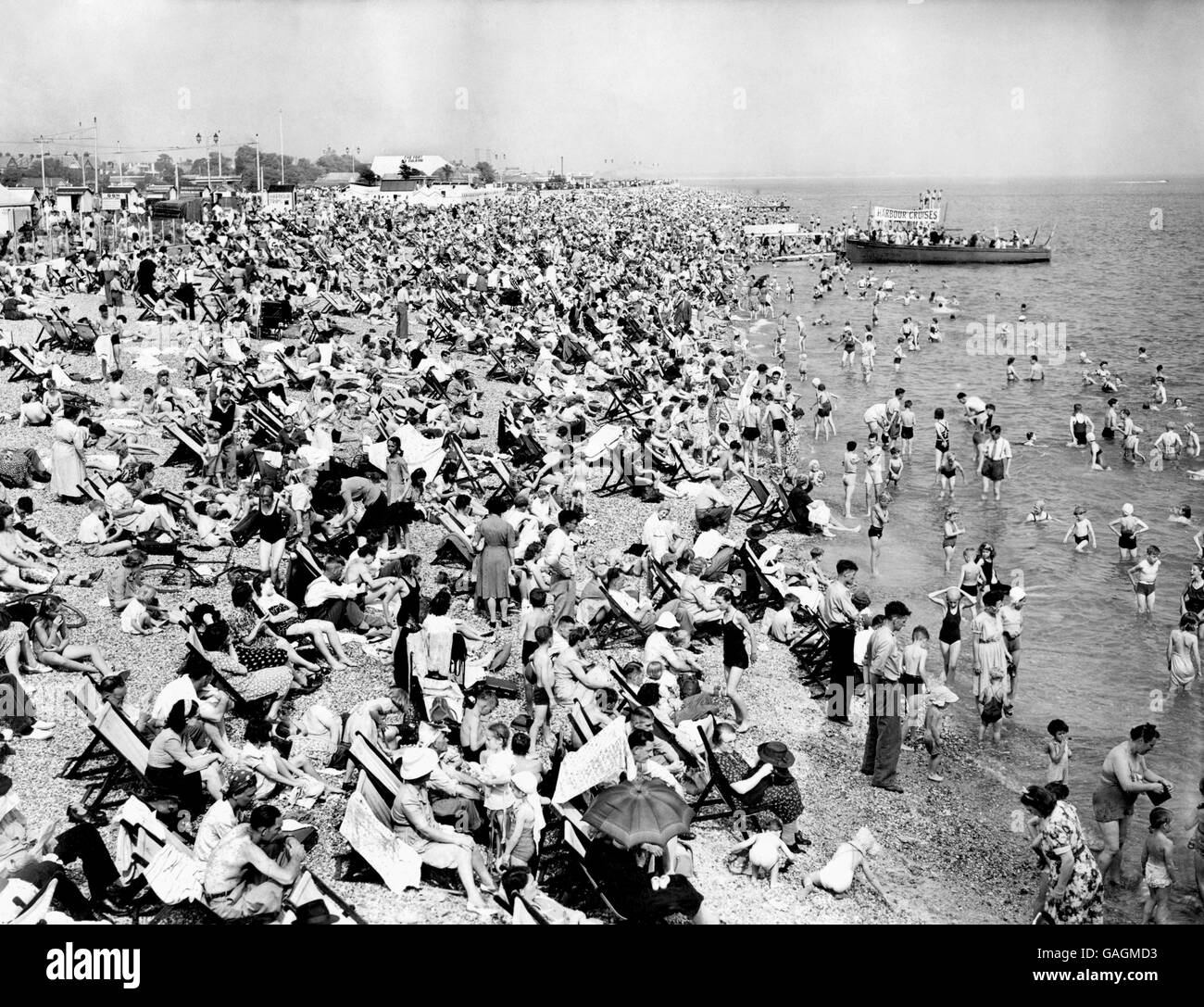 A crowded beach at Southsea, as many people take advantage of the heat wave. Stock Photo