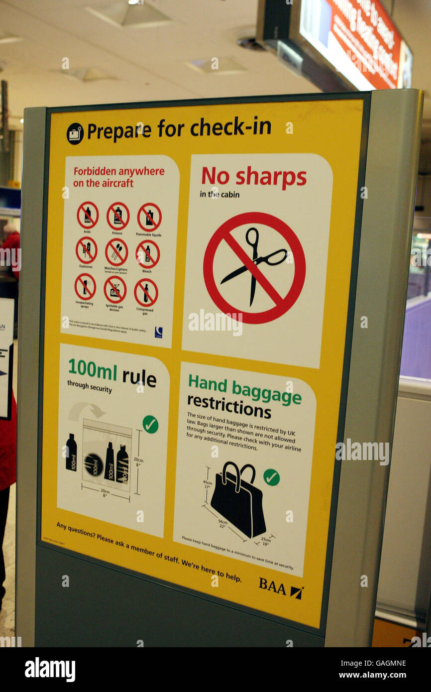 Airports 'coping well' with new baggage rules Stock Photo - Alamy