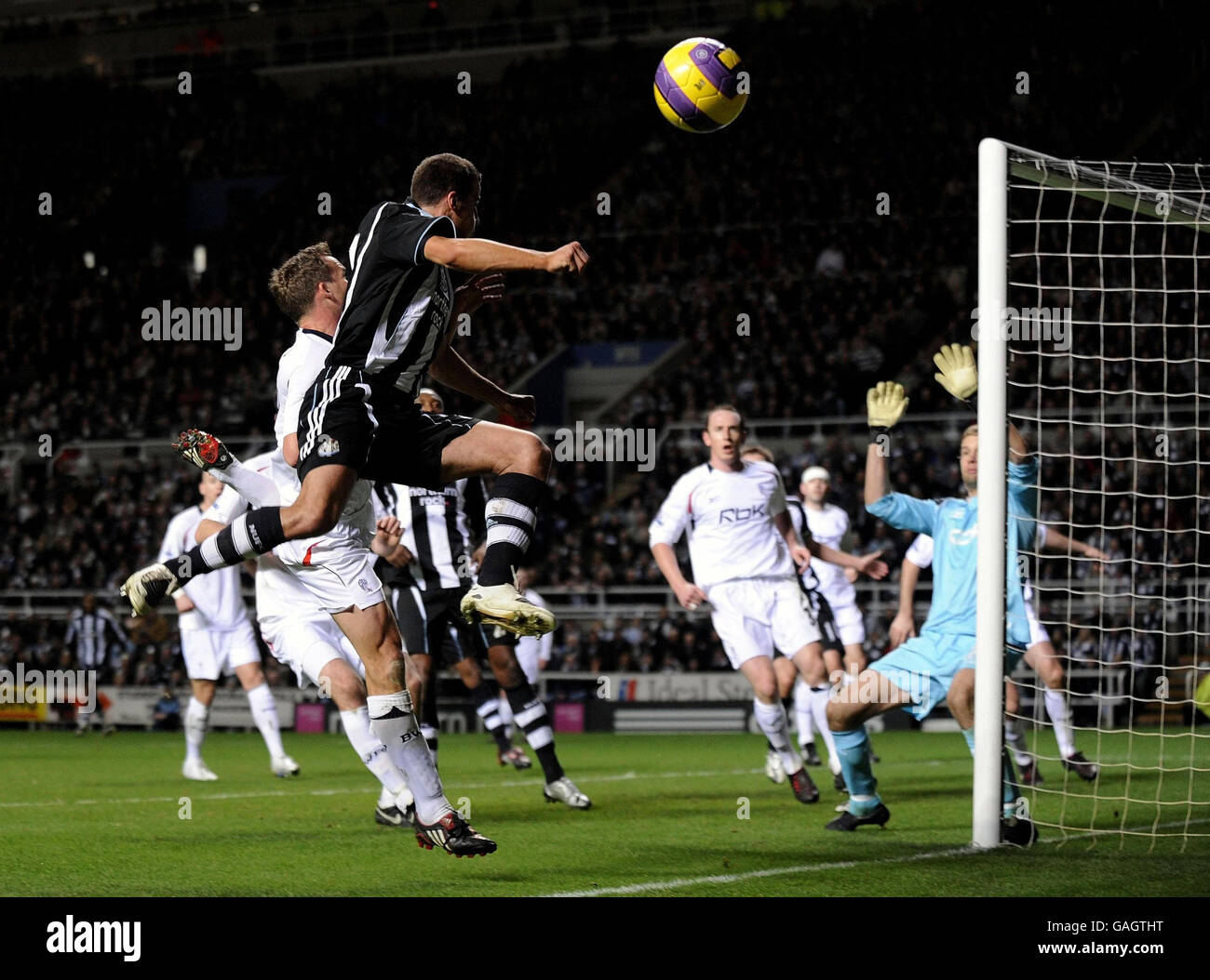Steve Taylor of Newcastle just heads wide during the Barclays Premier League match St James' Park, Newcastle. Stock Photo