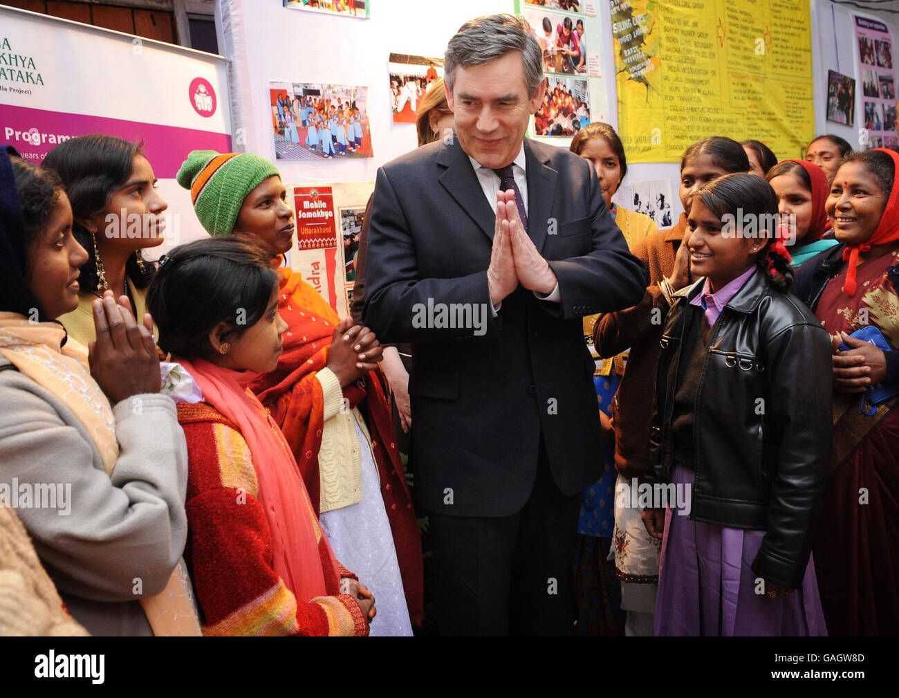 Prime Minister Gordon Brown and his wife Sarah meet women from the Mahila Samalchya Women's Empowerment Project in Delhi today with the traditional Indian greeting Namaste. He is on the second leg of his most far-flung diplomatic mission since taking over at Number 10. Stock Photo