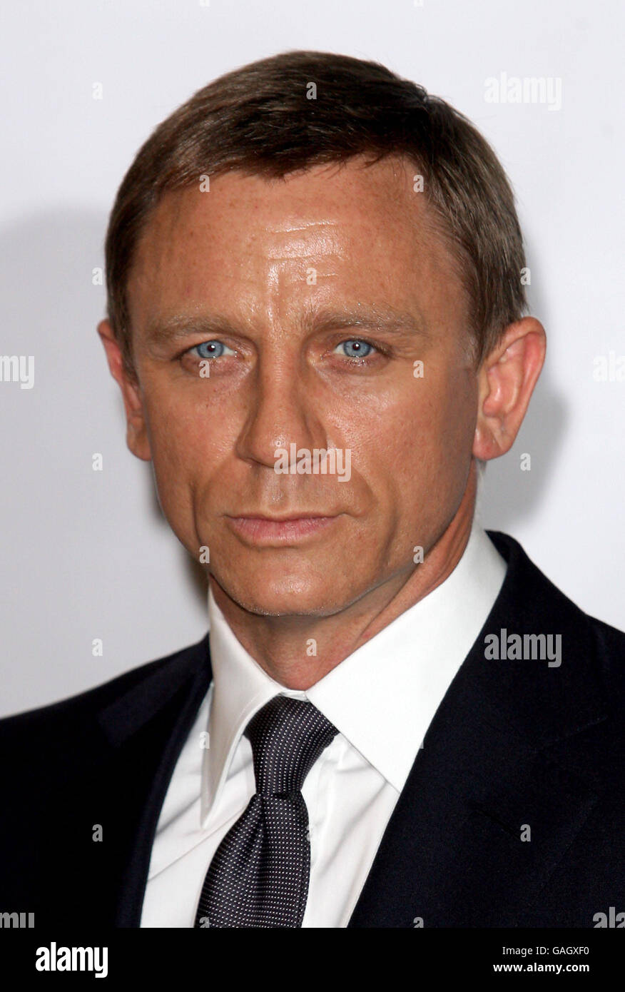 (left-right) Daniel Craig poses for the media during a photocall to ...