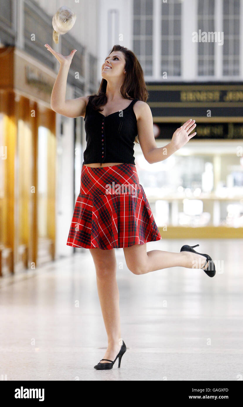 Miss Scotland Nieve Jennings tossing a haggis near Sloans Bar and
