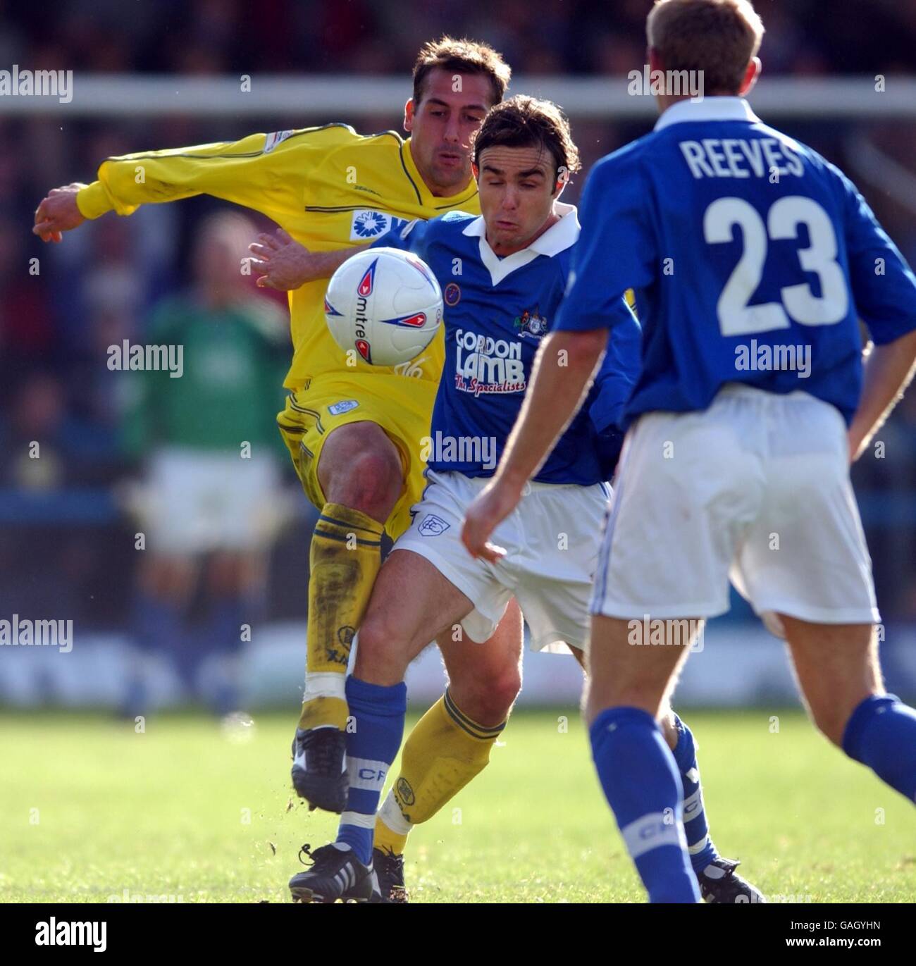 Chesterfield's Chris Brandon and Gary Jones of Tranmere battle for the 