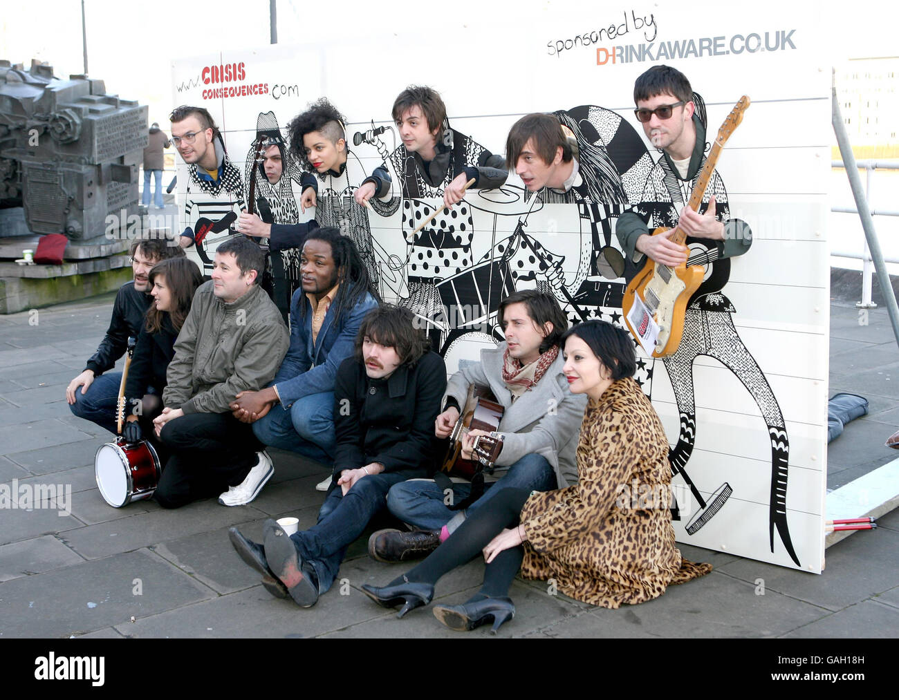 (left-right top row) Jon McClure from Reverend and the Makers, Gaz Coombes from Supergrass, Tahita Bulmer from the New Young Pony Club, Danny Goffey from Supergrass, Drew McConnell from Babyshambles, Graham Coxon from Blur. (Bottom row left-right) Andy Spence and Sarah Jones from the New Young Pony Club, unknown, Gary Powell, Didz Hammond and Carl Barat from Dirty Pretty Things and fashion designer Pearl Lowe, raise awareness for the homelessness charity Crisis' 'Consequences' campaign outside the Design Museum in London. Stock Photo