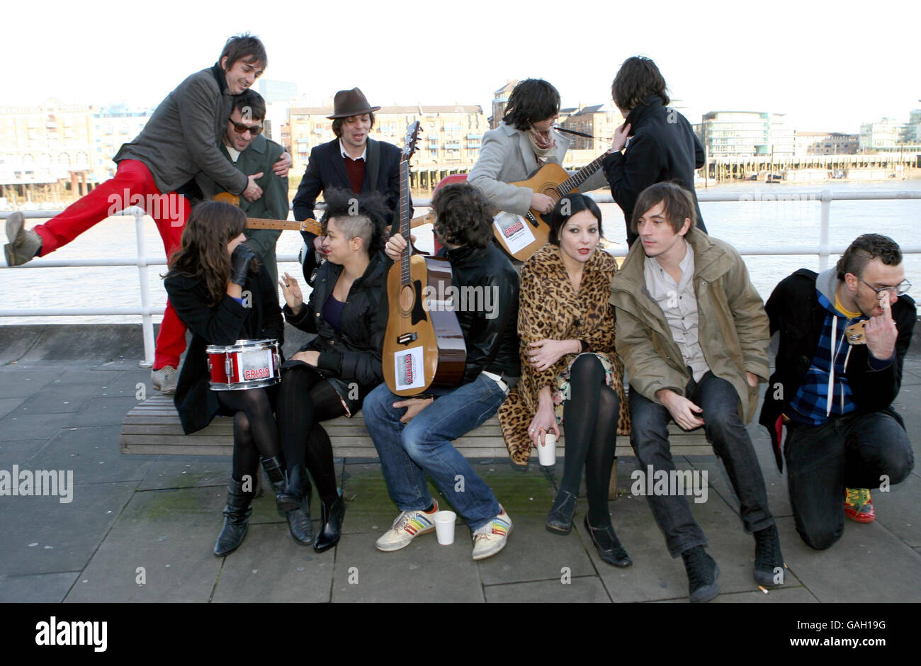 (back row, left-right) Danny Goffey from Supergrass, Graham Coxon from Blur, Gaz Coombes from Supergrass, Carl Barat and Didz Hammond from Dirty Pretty Things, (front row left-right) Sarah Jones, Tahita Bulmer and Andy Spence from the New Young Pony Club, fashion designer Pearl Lowe, Drew McConnell from Babyshambles and Jon McClure from Reverend and the Makers raise awareness for the homelessness charity Crisis' 'Consequences' campaign outside the Design Museum in London. Stock Photo