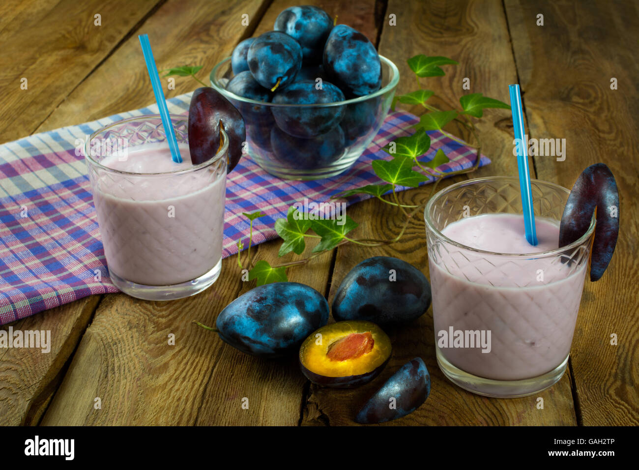 Fruit drink, plum smoothies, prune yogurt, diet healthy drink in a
