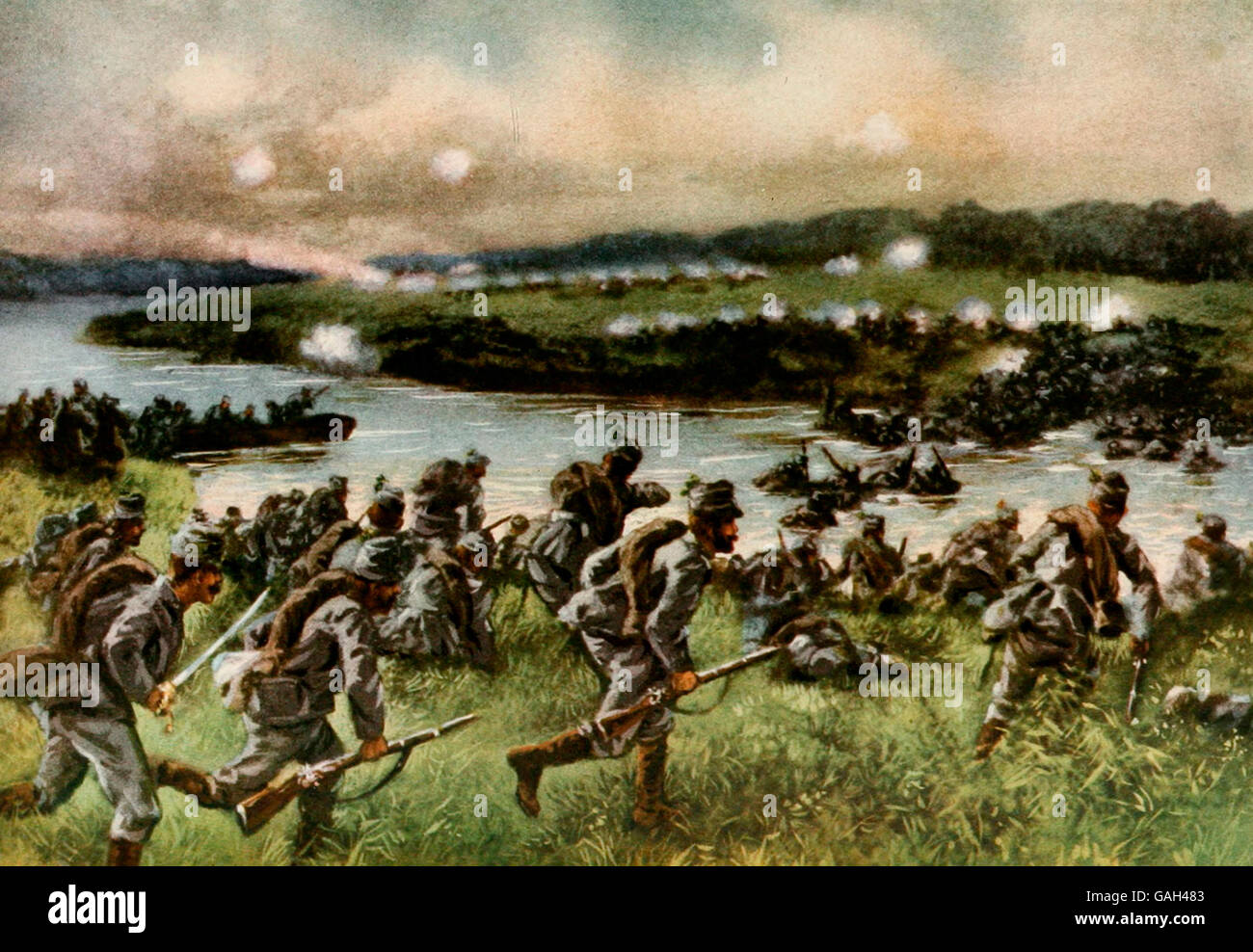 Austrian troops fording a river as the Russians withdraw during World War I Stock Photo