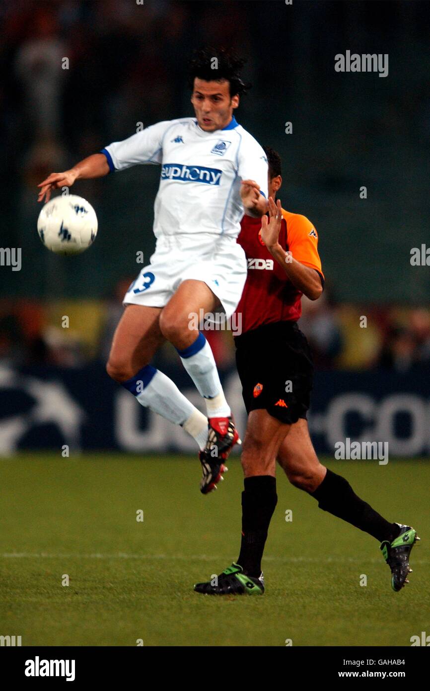 RC Genk's Akran Roumani jumps high to control the ball Stock Photo