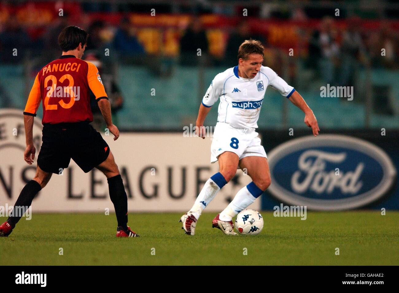(L-R) Roma's Christian Panucci tracks RC Genk's Wesley Sonck Stock Photo