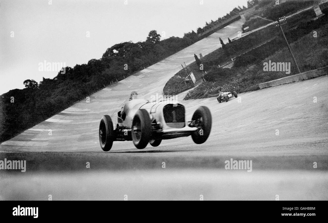Famous racing driver, John Cobb in his Napier Railton at speed during the 500 Miles Race at Brooklands. Stock Photo