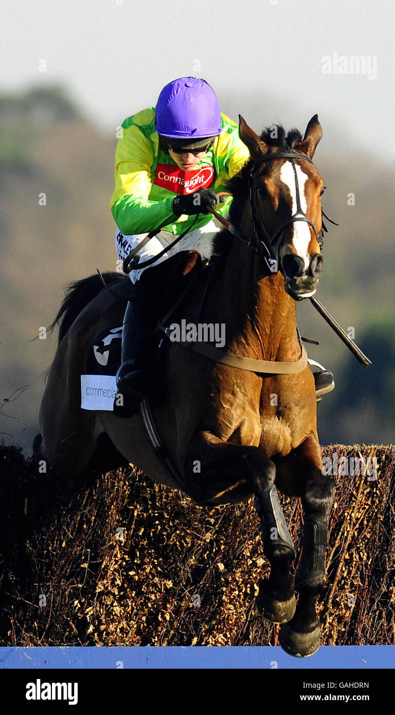 Kauto Star and jockey Ruby Walsh jump the last to win The Commercial First Ascot Steeple Chase at Ascot Racecourse, Berkshire. Stock Photo