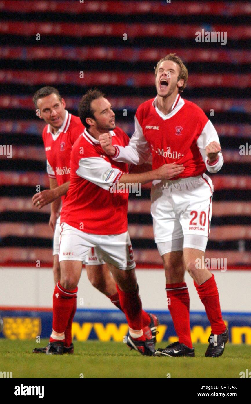 (L-R) Rotherham United's Nick Daws and Darren Garner congratulate teammate Andy Monkhouse on scoring the equalising goal Stock Photo
