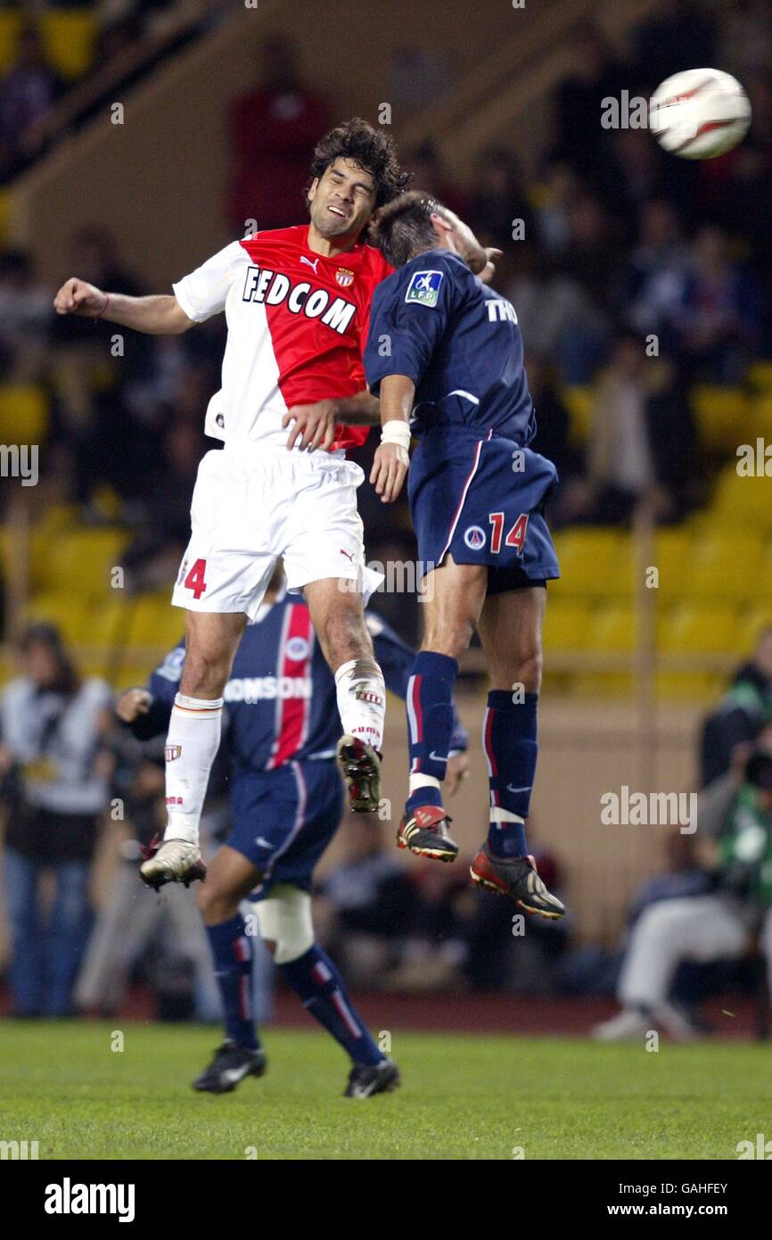(L-R) Monaco's Rafael Marquez and Paris Saint Germain's Fabrice Fiorese battle for the ball. Stock Photo