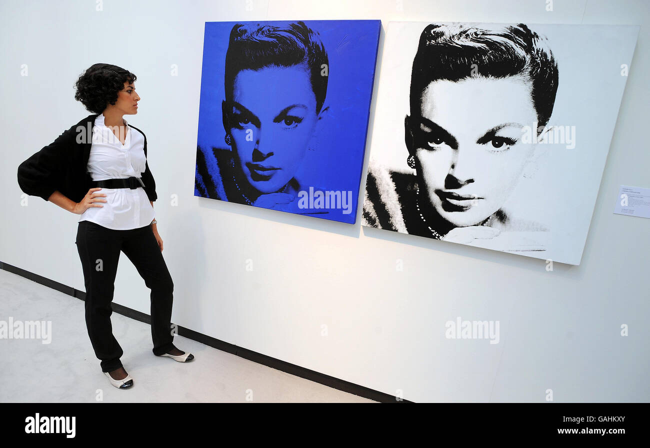 Two silk screen images of Judy Garland, 1978-79, by Andy Warhol on view at Christie's Old Brompton Road gallery, London. Stock Photo