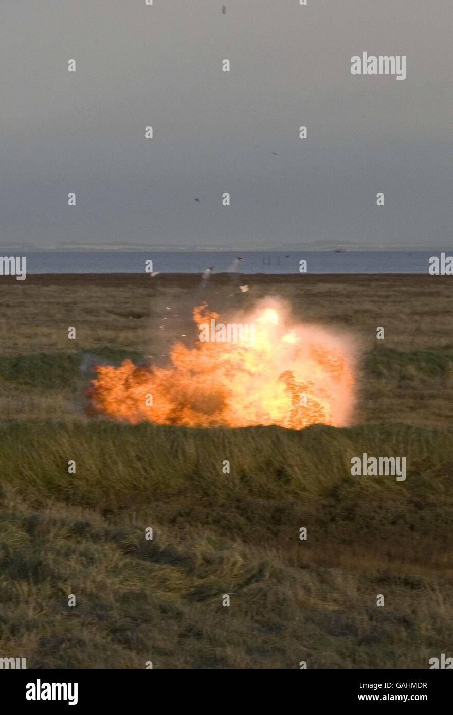 Britain's Queen Elizabeth II pictured during visits the RAF bombing range RAF Holbeach on the Wash in Lincolnshire where she viewed a Tornado Jet bombing run and detonated some explosive ordinance. Stock Photo