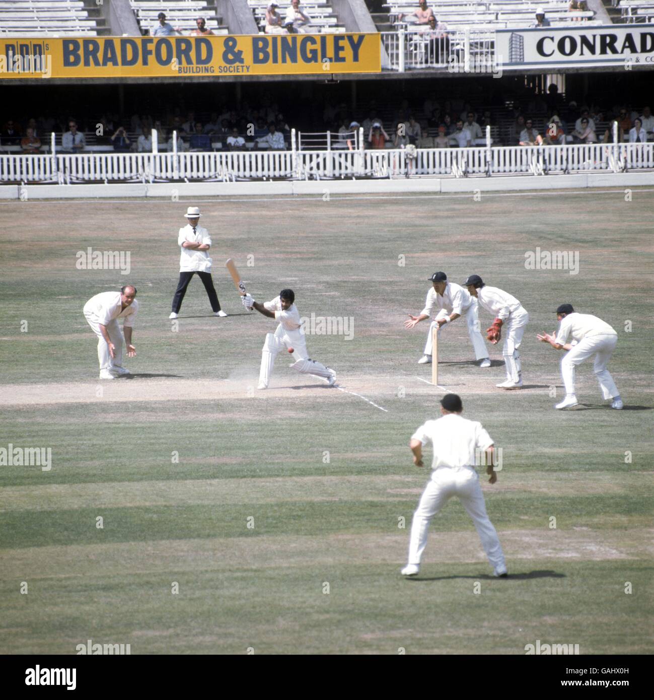 West Indies' Alvin Kallicharran (second l) plays the ball square, watched by (l-r) England's Brian Close, David Steele, Alan Knott and Chris Old Stock Photo