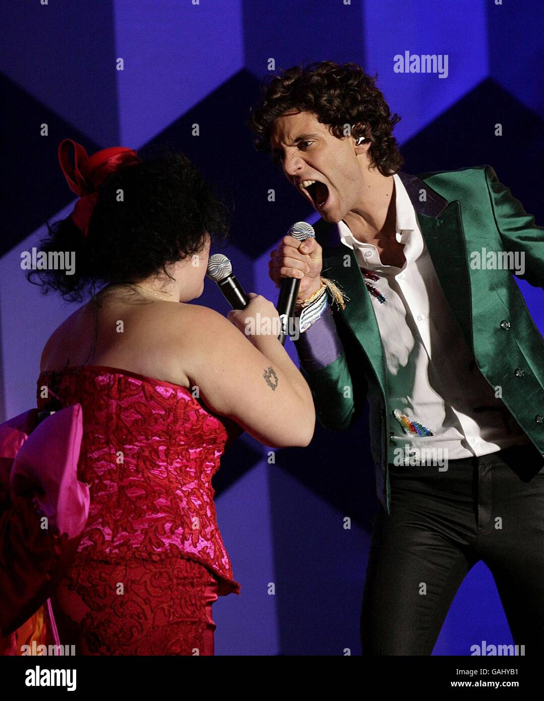 Mika performs on stage with Beth Ditto, during the BRIT Awards 2008, at Earls Court in central London. Stock Photo