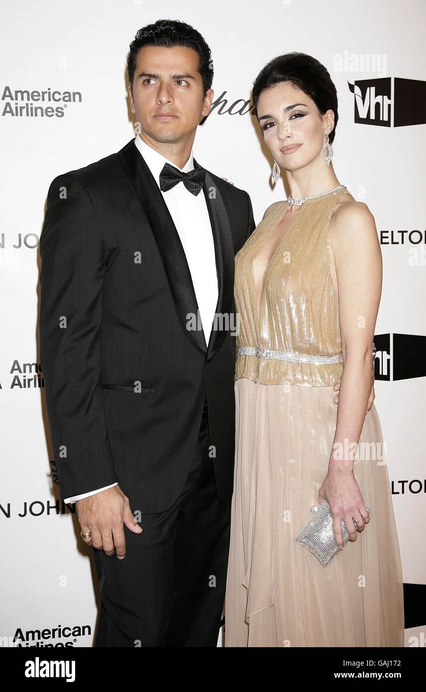 Paz Vega (right) and husband Orson Salazar arrive for the 16th Annual Sir Elton John AIDS Foundation Oscar Party at the Pacific Design Centre in Los Angeles. Stock Photo
