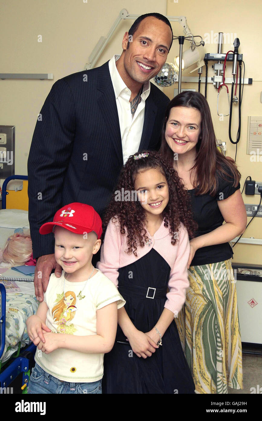 Dwayne 'The Rock' Johnson and Madison Pettis (in pink and black), co