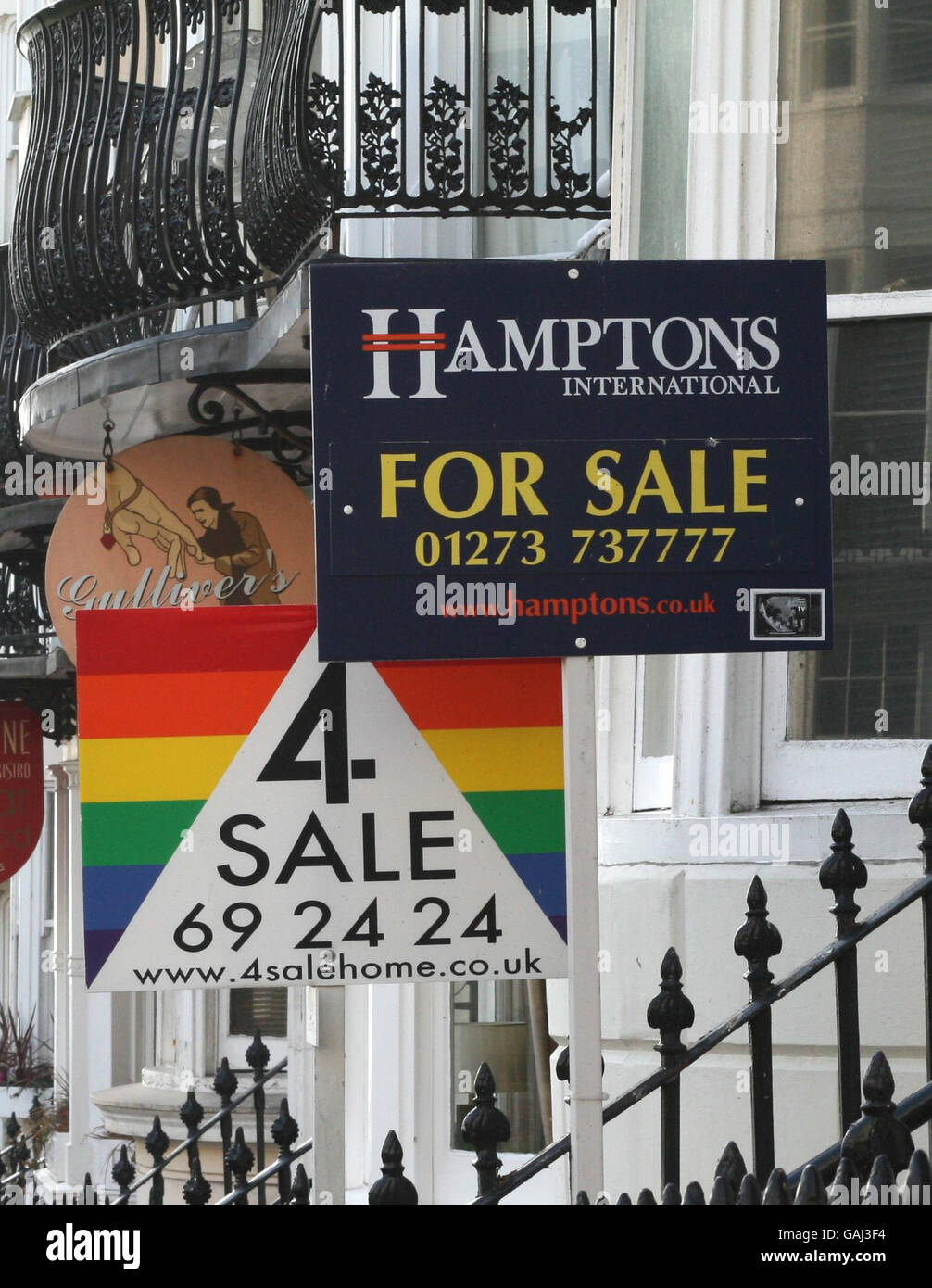 Estate Agents' boards in Brighton. House prices continued to fall this