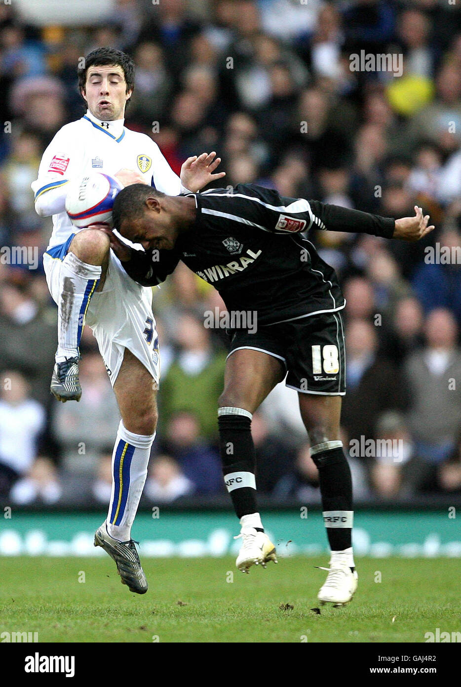 Tranmere Rovers Jennison Myrie-Williams and Leeds United's Alan Sheehan during the League One match at Elland Road, Leeds. Stock Photo