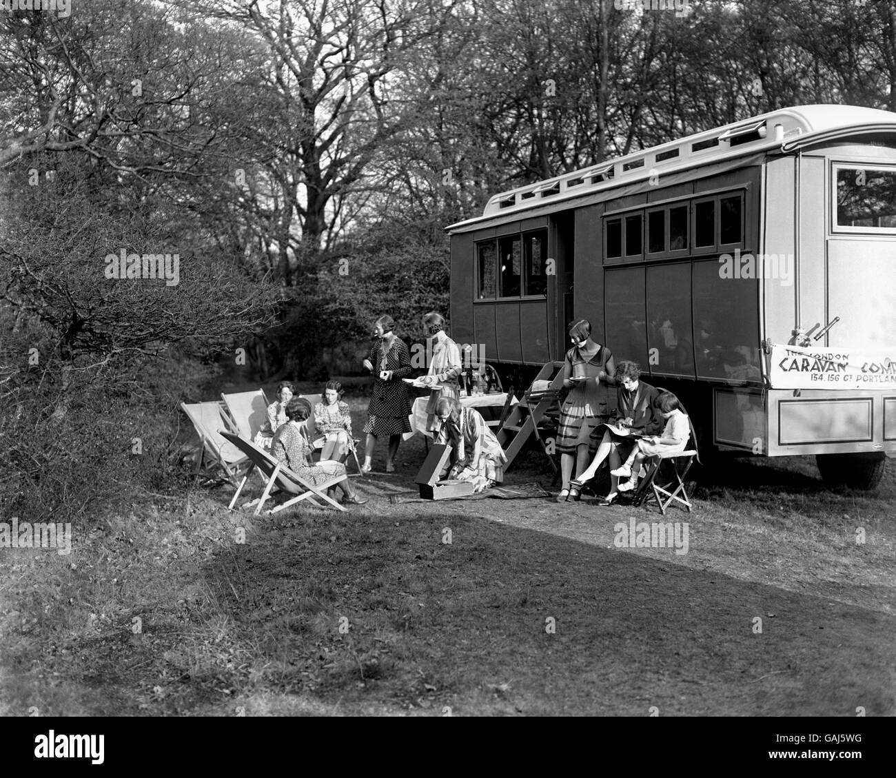 Holiday makers with a trailer caravan, solving many difficulties for those who want to see Britain. Caravanning was to become increasingly more popular from the mid 1930's. Stock Photo