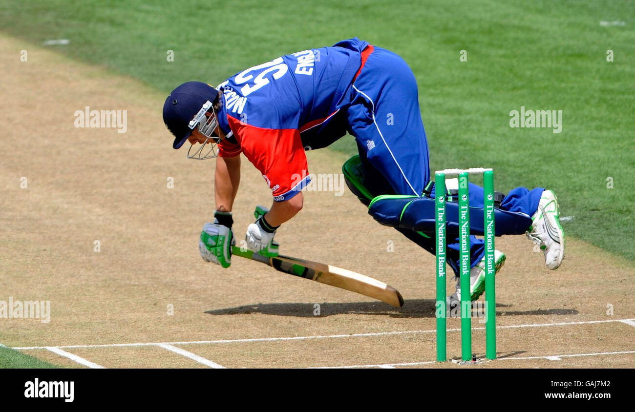 England's Phil Mustard stops a ball but falls during the second ODI at Seddon Park, Hamilton, New Zealand. Stock Photo