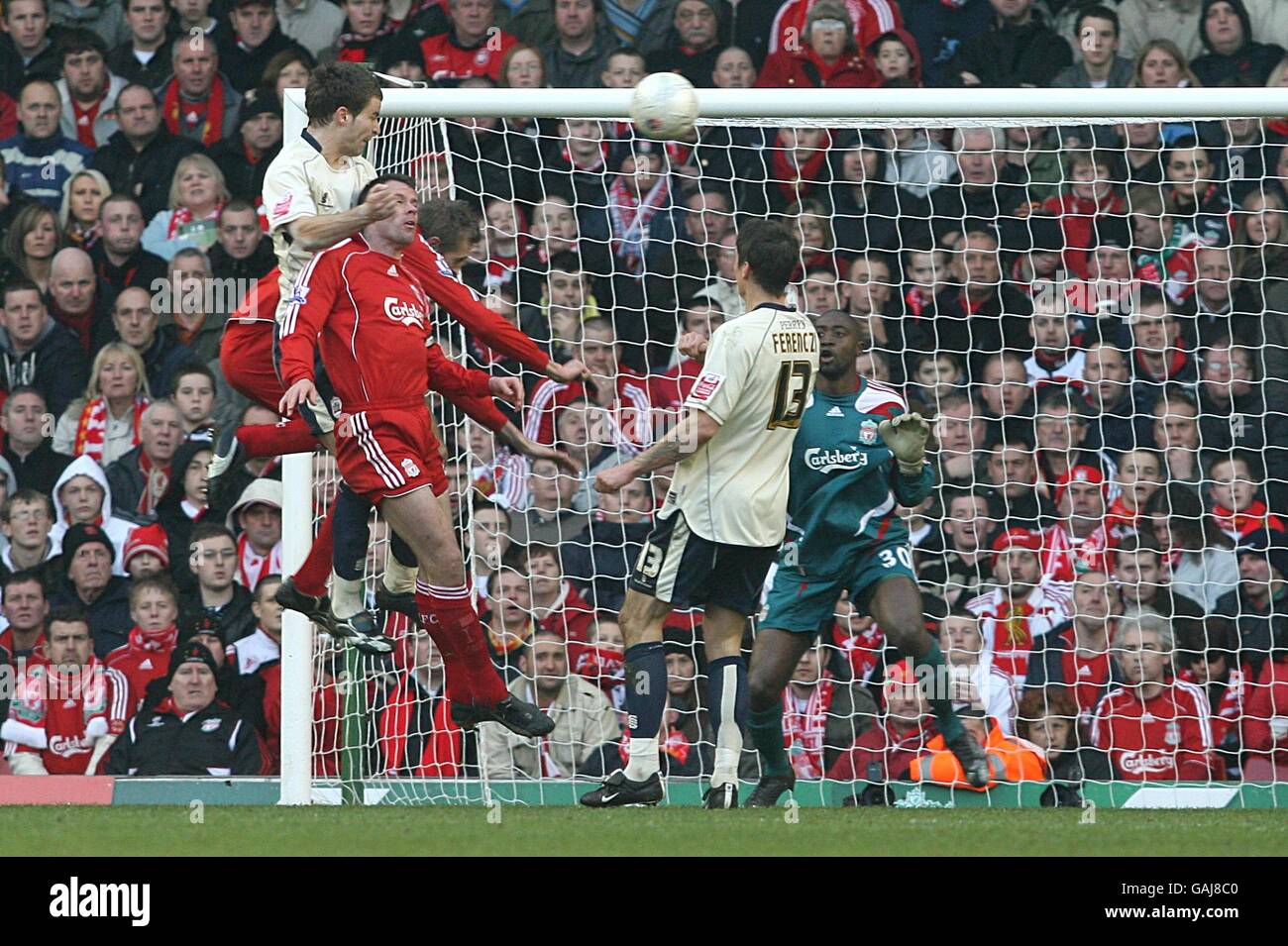 Barnsley's Stephen Foster heads in the equaliser past Liverpool goalkeeper Charles Itandje Stock Photo