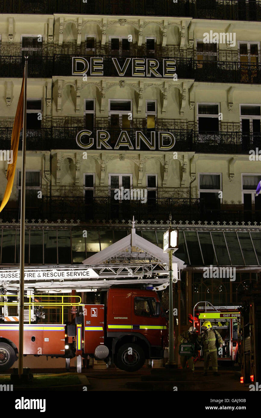 Firefighters tackle a fire at the historic Grand Hotel on Brighton seafront. Stock Photo