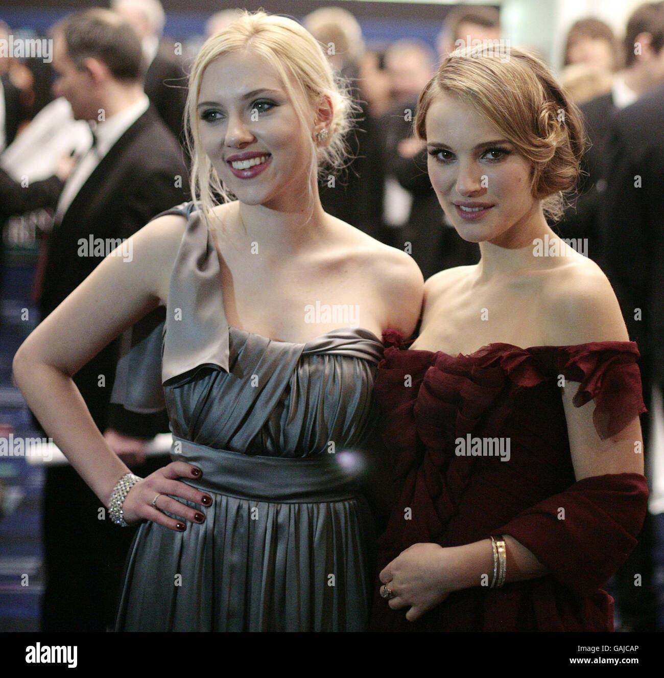 US actors Natalie Portman (right) and Scarlett Johansson attend the royal film Premiere of "The Other Boleyn Girl" at the Odeon, Leicester Square cinema in central London in aid of The Cinema and Television Benevolent Fund. Stock Photo